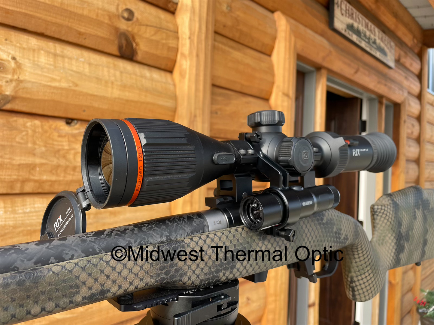 laser range finder mounted next to thermal scope